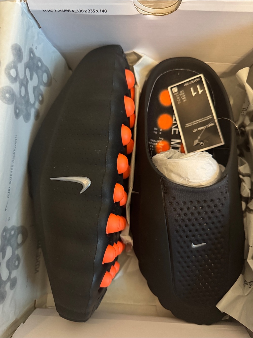Black Slip-On Soccer Cleats with Orange Studs